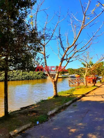 CASA EM CARAGUATATUBA COM 06 SUÍTES, EM FRENTE DO RIO JUQUERIQUERE, NAVEGAVEL, PESCA, ESPORTES NAUTICOS EXCELENTE LOCALIZAÇÃO,