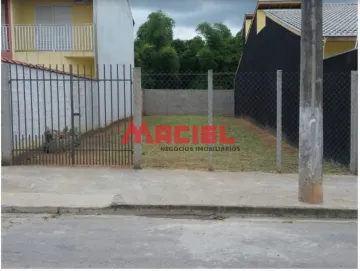 Lote plano e murado