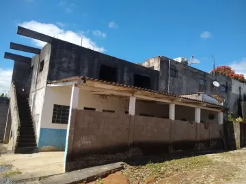 Sobrado com terreno e ponto comercial já alugado