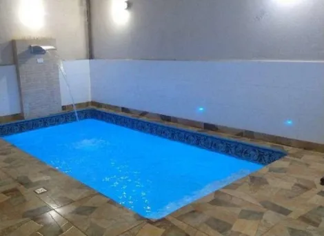 Casa assobradada com piscina